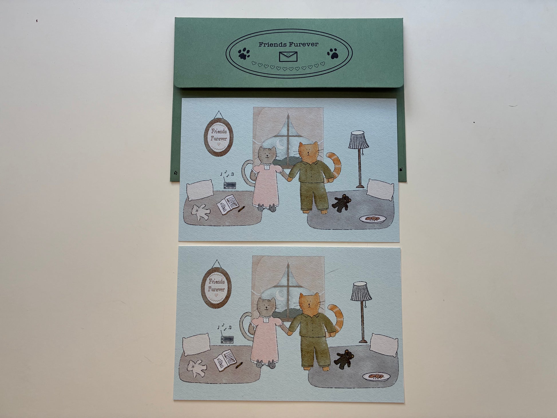Envelope with two art print postcards for the Share the Joy -- Friends Furever Mail Club Duo